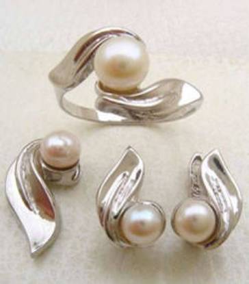Real fresh water pearls set with rhodium plated