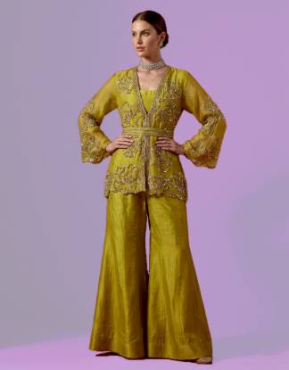 Brass organza peplum jacket with a silk sharara, suited to Pakistani formal dresses USA, Pakistani velvet formal dress, Indian party wear formal dress, Indian cocktail dress with embellishments, formal dresses for Pakistani weddings, Indian receptions, and Muslim women.