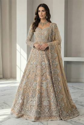 Sandstone Beige net gown and raw silk lehenga for a bridal gown for Pakistani brides in USA, wedding gown for Indian brides in UK, Pakistani bridal gown designs for wedding in USA, Pakistani bridal gown shopping, custom Indian bridal gown in UK, designer Pakistani bridal gown, lace bridal gown in Norway.