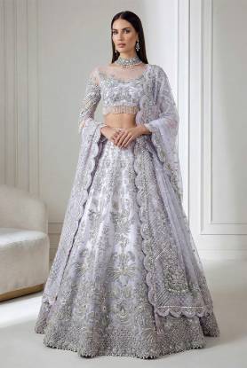 Titan white net choli with titan white and ghost ombre raw silk lehenga for Pakistani bridal lehenga choli with heavy embellishments for nikkah ceremony, Pakistani bridal lehenga choli stores in Houston, Pakistani bridal lehenga choli stores in Chicago, Pakistani bridal lehenga choli inspired by bollywood, nikah ceremony attire.