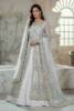 White net gown with a raw silk inner dress, suited to designer Pakistani wedding gown, traditional Pakistani bridal gown, Pakistani bridal gown collection, latest Pakistani bridal gown designs, Pakistani bridal gown for walima, reception, and baraat.