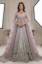Maverick net jacket with a light silver raw silk lehenga for Pakistani bridal trousseau, embroidered bridal dresses, custom Pakistani bridal outfits, bridal fashion in Pakistan by bridal dress designers in Pakistan, showing latest bridal dress designs and designer bridal dresses for Pakistani brides.