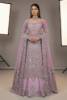 Melanie net shirt with a silk lehenga suited to Pakistani nikah dresses and nikah bridal wear, nikah ceremony attire, nikah dress for bride and groom, dresses for nikah, lehenga for nikah and baraat, nikah ceremony outfits, and traditional nikah attire rooted in traditional nikah attire.