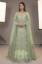 Tea green net shirt with a silk lehenga suited to Pakistani nikah dresses and nikah bridal wear, nikah ceremony attire, nikah dress for bride and groom, dresses for nikah, lehenga for nikah and baraat, nikah ceremony outfits, and traditional nikah attire rooted in traditional nikah attire.