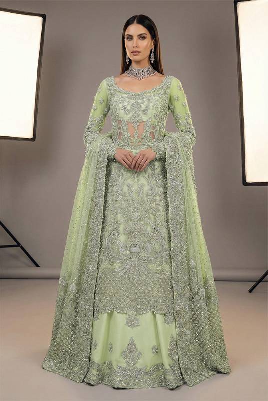 Tea green net shirt with a silk lehenga suited to Pakistani nikah dresses and nikah bridal wear, nikah ceremony attire, nikah dress for bride and groom, dresses for nikah, lehenga for nikah and baraat, nikah ceremony outfits, and traditional nikah attire rooted in traditional nikah attire.