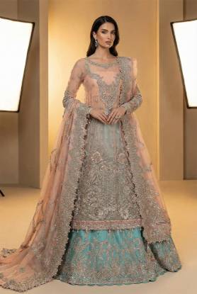 Rose fog net shirt with a tradewind raw silk lehenga, suited to modern nikah dresses and nikah dress designs online, offering nikah outfit ideas and colors, nikah attire for bridesmaids, nikah outfits for bride and groom, dresses for nikah, nikah ceremony dresses, and dresses for baraat.