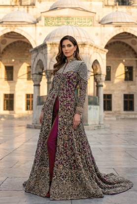 Berry net gown with berry raw silk pants, presented as a bridal gown for Pakistani brides in USA and a wedding gown for Indian brides in UK, reflecting Pakistani bridal gown designs for weddings in USA, custom Indian bridal gown in UK, designer Pakistani bridal gown, and red Pakistani bridal gown in Norway.