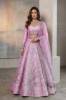 Orchid Raw silk Blouse and Lehenga is a Pakistani bridal lehenga choli with heavy embellishments for nikkah ceremony. Find this Nikah ceremony attire at Pakistani bridal lehenga choli stores in Houston and Chicago.
