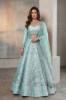 Uranus Raw silk Blouse and Lehenga is a Pakistani bridal lehenga choli with heavy embellishments for nikkah ceremony. Find this Nikah ceremony attire at Pakistani bridal lehenga choli stores in Houston and Chicago.