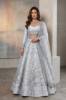 White Raw silk Blouse and Lehenga is a Pakistani bridal lehenga choli with heavy embellishments for nikkah ceremony. Find this Nikah ceremony attire at Pakistani bridal lehenga choli stores in Houston and Chicago.