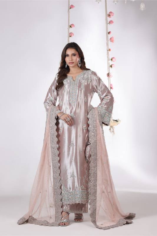 Shop this Montana lame tissue silk long shirt and Montana lame tissue silk izaar. Discover luxury formal dresses and explore our exquisite collection of Pakistani formal dresses and Pakistani party wear dresses.